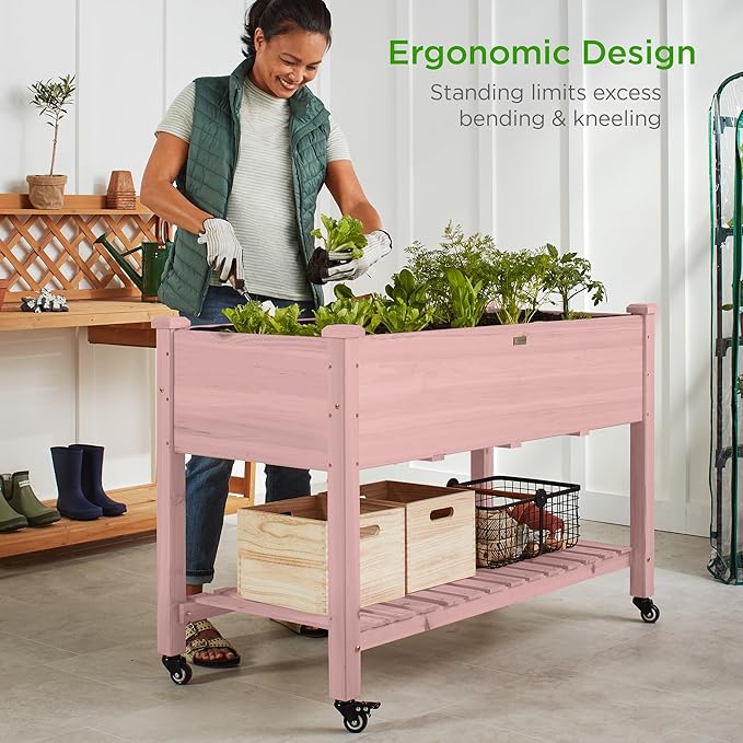 Best Choice Products Raised Garden Bed 48x24x32-inch Mobile Elevated Wood Planter w/Lockable Wheels Storage Shelf Protective Liner - Pink