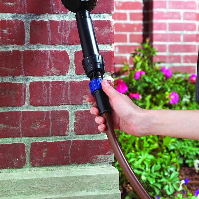 Raindrip SDFSTH1P Automatic Drip Irrigation Watering Kit with Timer for Flowers Shrubs and Trees Waters up to 10 Plants Includes Timer with Customizable Settings 2 GPH Drippers